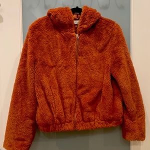 Fuzzy rust-coloured zip-up